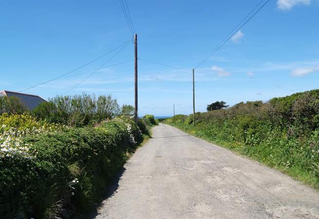 The lane leading past Westcliff to the Marconi Monument and the coastal footpath to Poldhu Cove, a ten minute walk away.