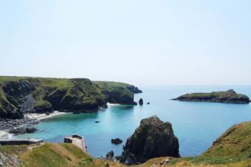 The view from the clifftop beside the renowned Mullion Cove Hotel, looking down towards the harbour entrance.