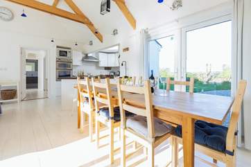 Plenty of room for all around the fabulous dining table.