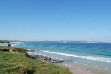 The magnificent view from the coastal footpath at Godrevy, across to St Ives at the far end of the bay.