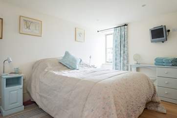 Bedroom 1 is furnished in calm colours to aid your restful sleep.