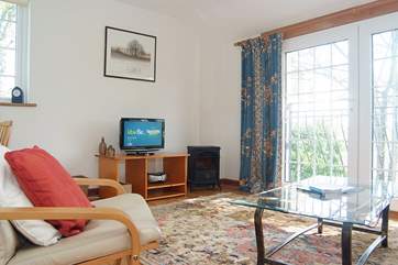 Plenty of light floods into the living-room.