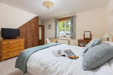 There is plenty of space in the bedroom.