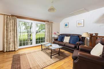 The living-room has countryside views.