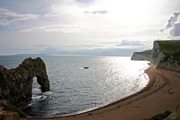 Looking west along the coast from Durdle Door. The Isle of Portland is visible in the distance.