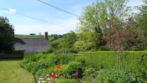 The landscaped gardens are particularly special and look out over the top of the village and to stunning views across the valley.