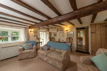 This period cottage has great character and plenty of traditional features. The door to the right leads to the stairs.