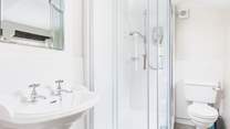 For guests who prefer a shower, this separate ground floor shower room is spacious and bright.