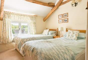 Bedroom is a bright and spacious twin with those amazing views over the garden and beyond.