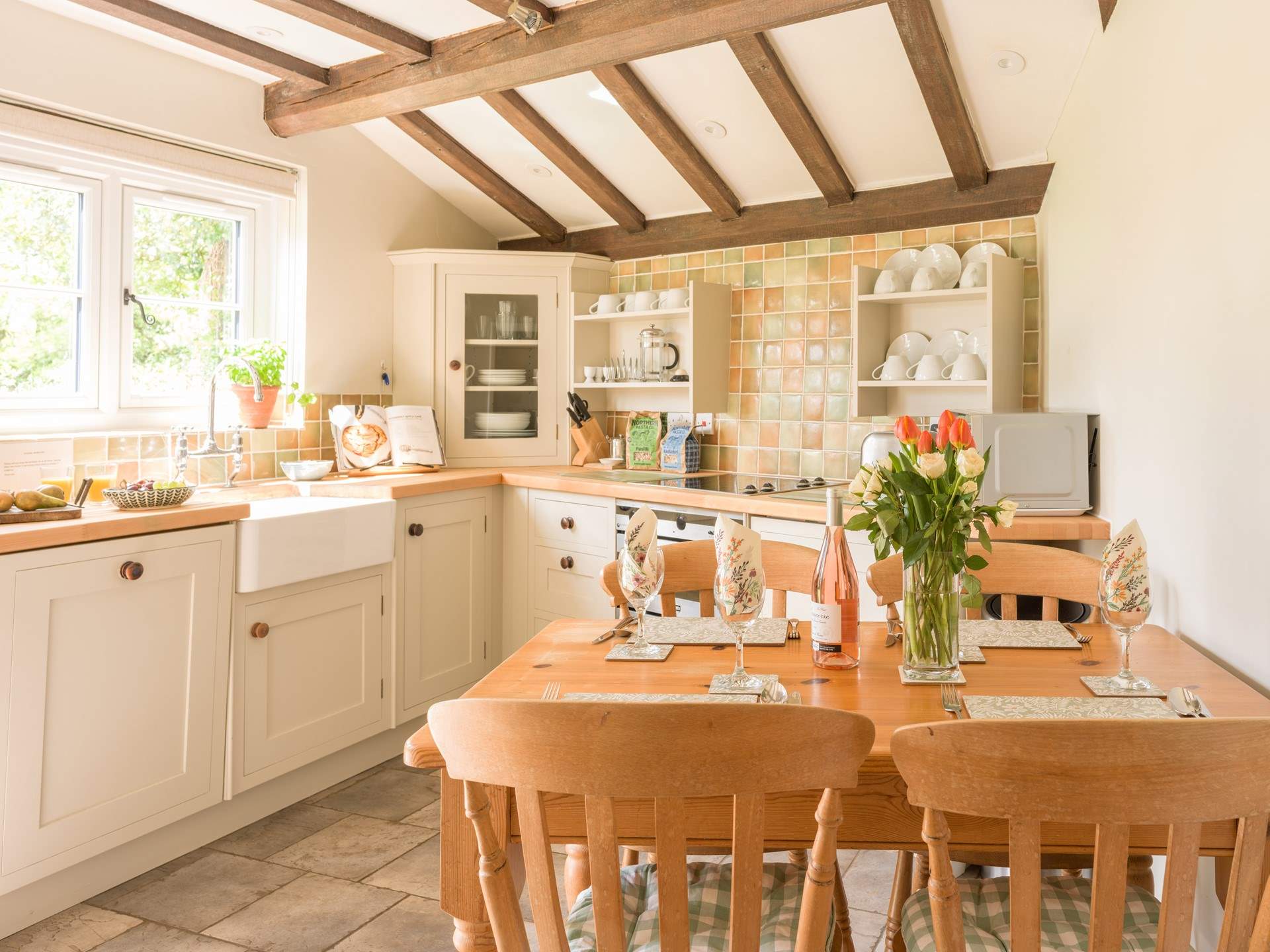 This perfect country kitchen is well equipped and is perfect on a sunny day with the door open to the garden...