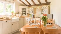 This perfect country kitchen is well equipped and is perfect on a sunny day with the door open to the garden...