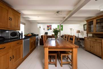 The kitchen and dining-areas.