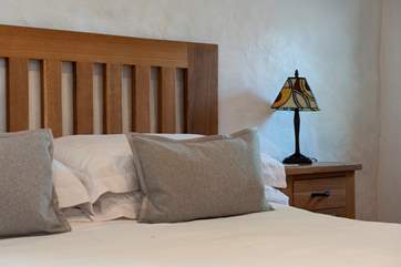 Luxury bed linens throughout.