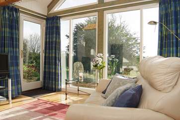 A door leads from the sitting-area to a small secluded, sun-trap patio.