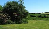 The view from the cottage over the lawn to the owners' fields beyond. - Thumbnail Image