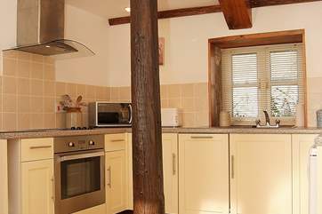 The kitchen-area is fully-equipped.