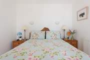 The pretty double bedroom.