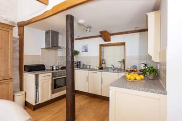 The kitchen has plenty of room for you to cook up holiday meals together