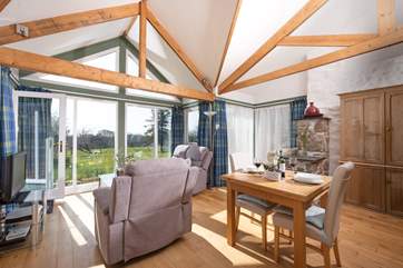 The large windows let the light flood in and really take advantage of the beautiful setting