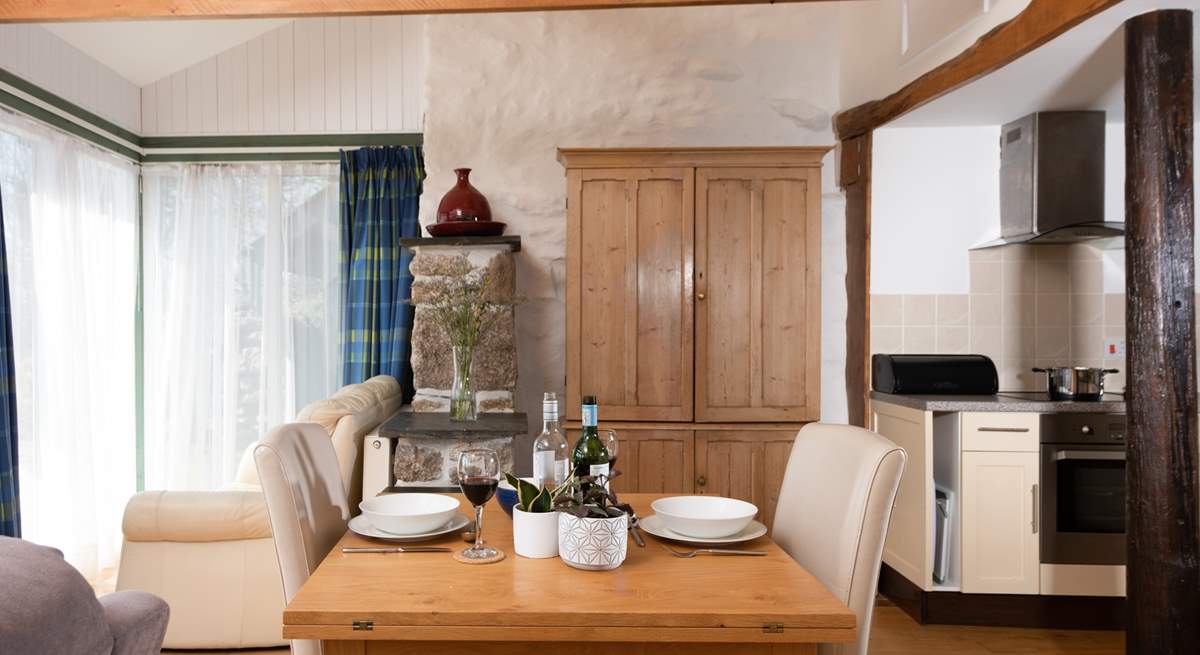 Open plan living makes it easy to serve up your meals.