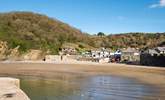 At the sheltered cove of Polkerris you can try your hand at some water sports or pull up a pew at the beachside pub or bistro and watch others show you how it's done. - Thumbnail Image