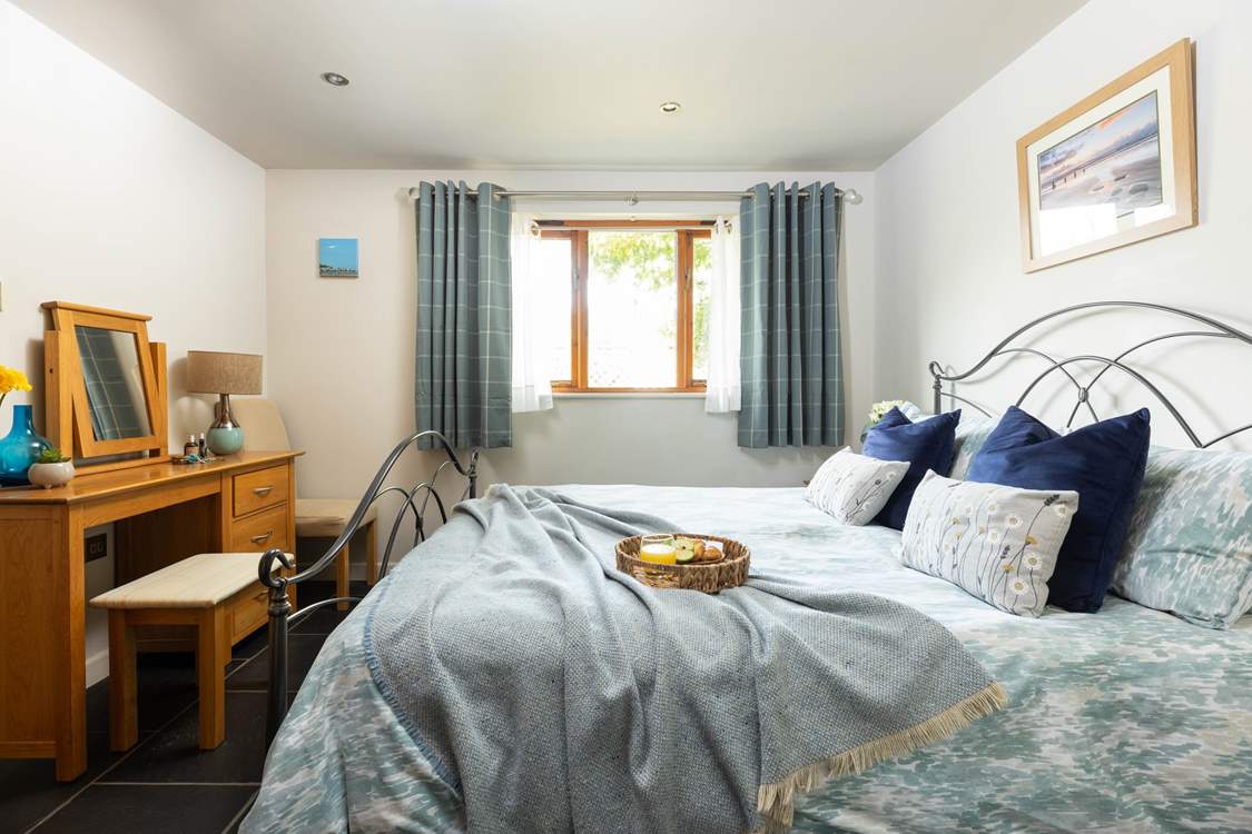 The bedroom is beautifully presented.