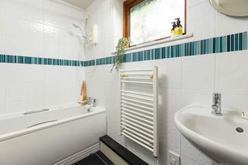 The perfectly formed ensuite bathroom, offering the option of both a bath and a shower.
