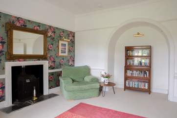 The second sitting room offers a place to read and relax.