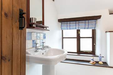 The bathroom on the first floor.