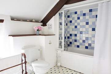 There is a fitted shower over the bath.