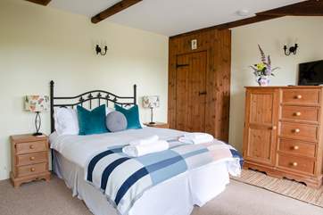 The bedroom in the attached annexe has its own en suite bathroom.