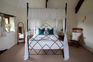 The spacious first floor double bedroom.