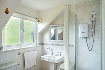 The en suite shower-room to Bedroom1.