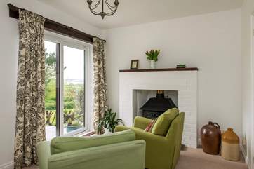 Patio doors lead out from the study to the garden