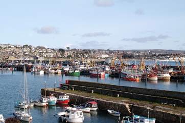 Newlyn harbour, just one mile away.