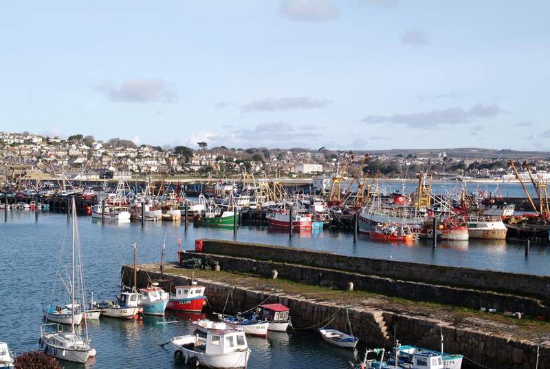 Newlyn harbour, just one mile away.