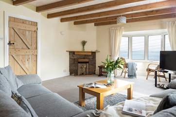Curl up on the cosy sofa with a good book, the perfect holiday pastime.