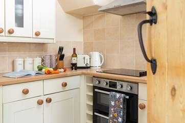 The kitchen is light and bright.