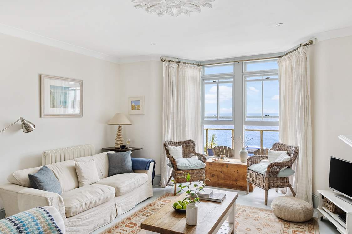 The relaxing open plan living-area is beautifully light and airy with those wonderful sea views.