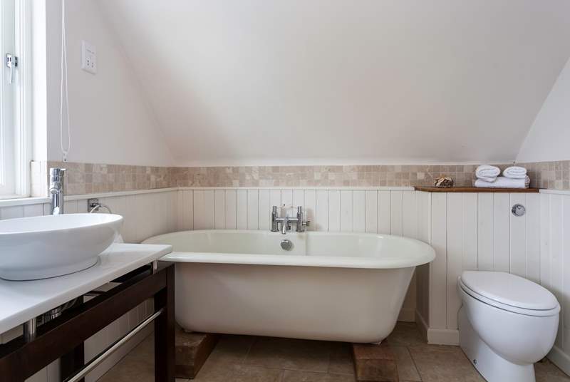 Bedroom 5 has a fabulous roll-top bath in the en suite. 