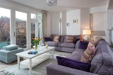 The lovely living-room complete with toasty wood-burner.