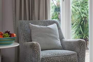 This lovely arm chair is perfect for curling up in and reading a book.