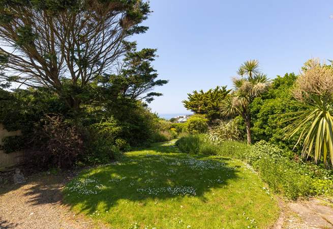 Follow the garden path to the gate which leads you on a path down to the beach.