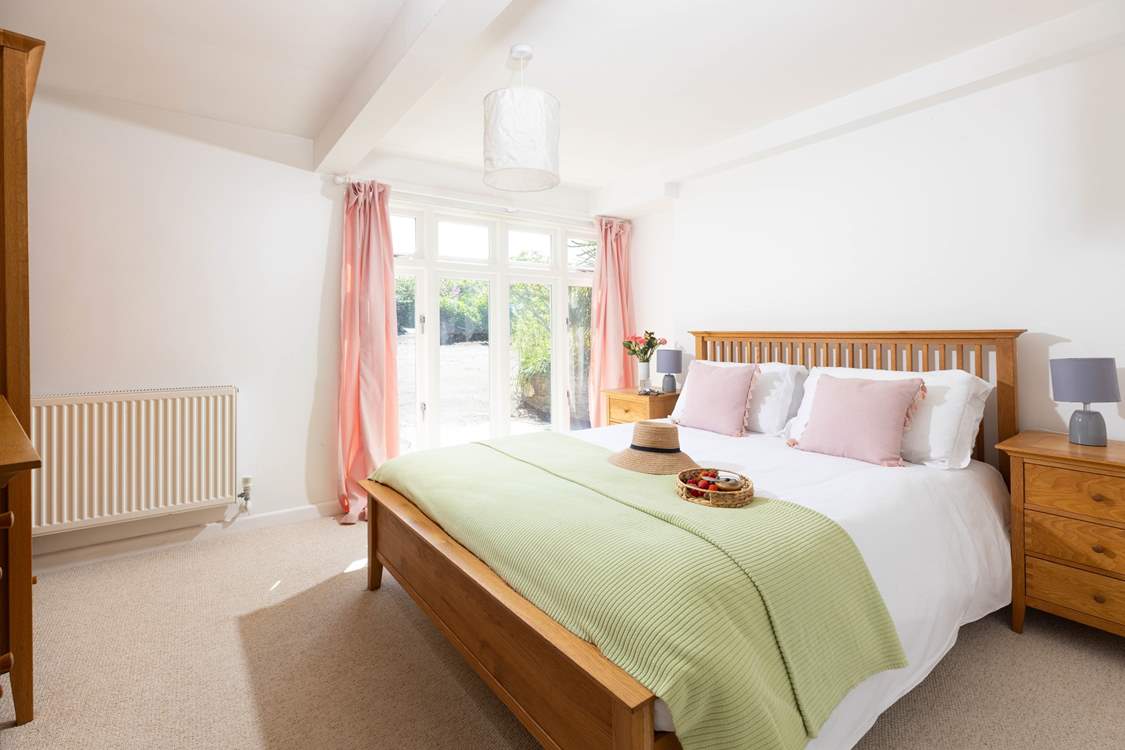 Bedroom 1 is on the ground floor and has a King-size bed and a calm feel to it.
