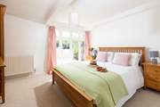 Bedroom 1 is on the ground floor and has a King-size bed and a calm feel to it.
