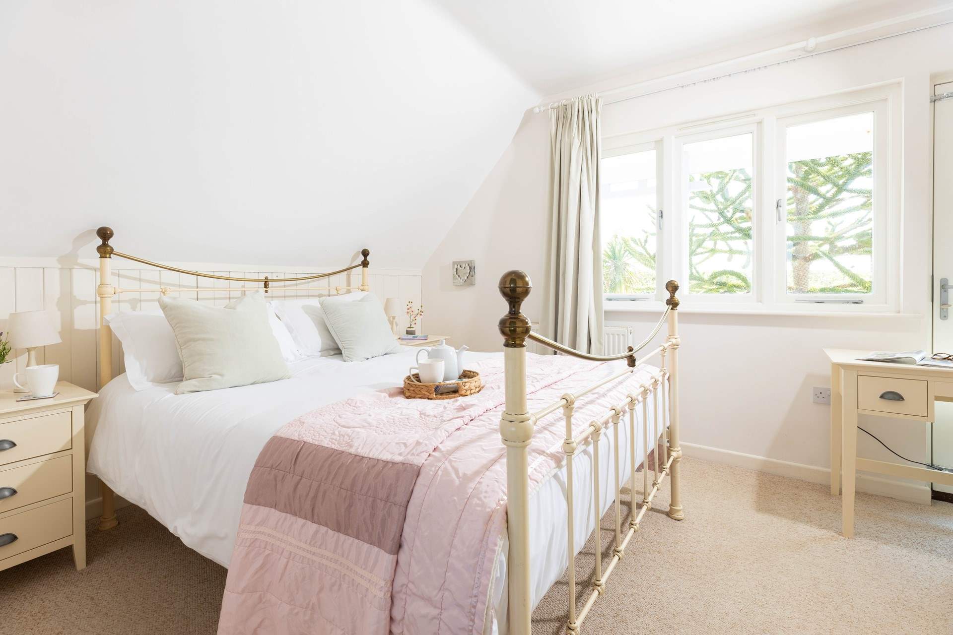 Pretty Bedroom 5 overlooks the front of the property, and is located on the first floor.