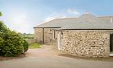 Gilly Barn is a semi-detached converted single barn with living rooms on the ground floor and bedrooms below. - Thumbnail Image