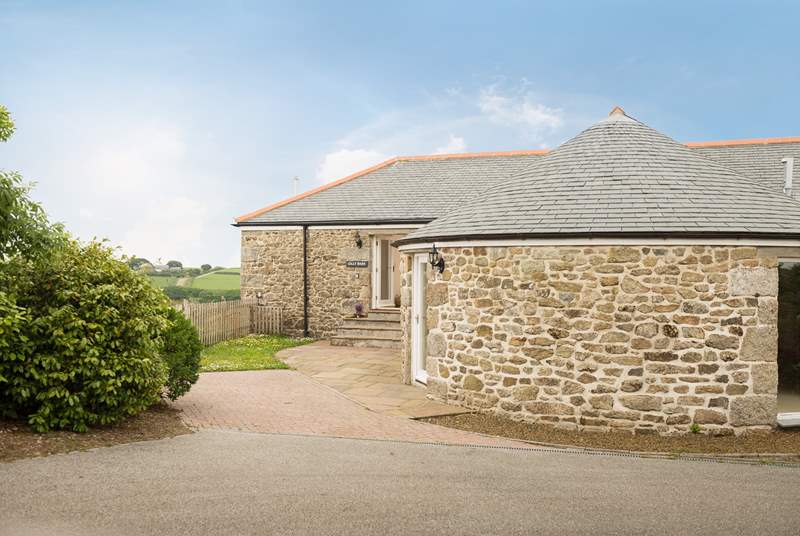 Gilly Barn is a semi-detached converted single barn with living rooms on the ground floor and bedrooms below.
