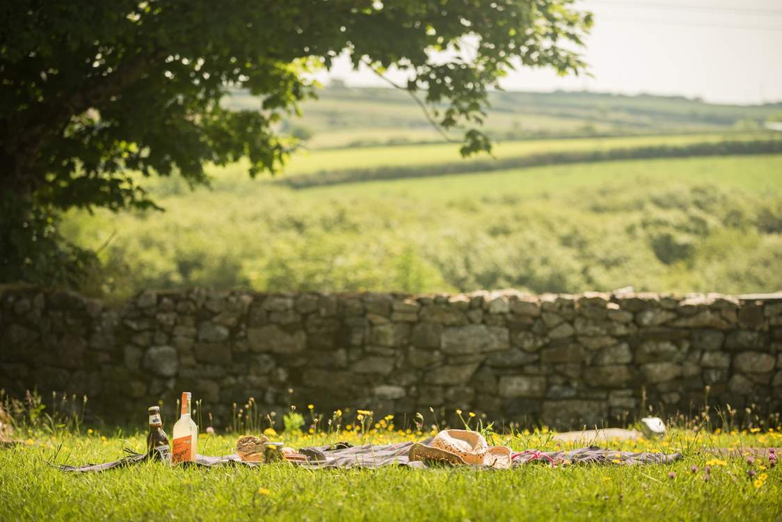Countryside views surround the gardens.