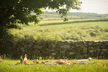 Countryside views surround the gardens.
